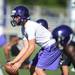Pioneer's Aedan York  calls out a play during a morning practice at Pioneer High School on Monday. Melanie Maxwell I AnnArbor.com